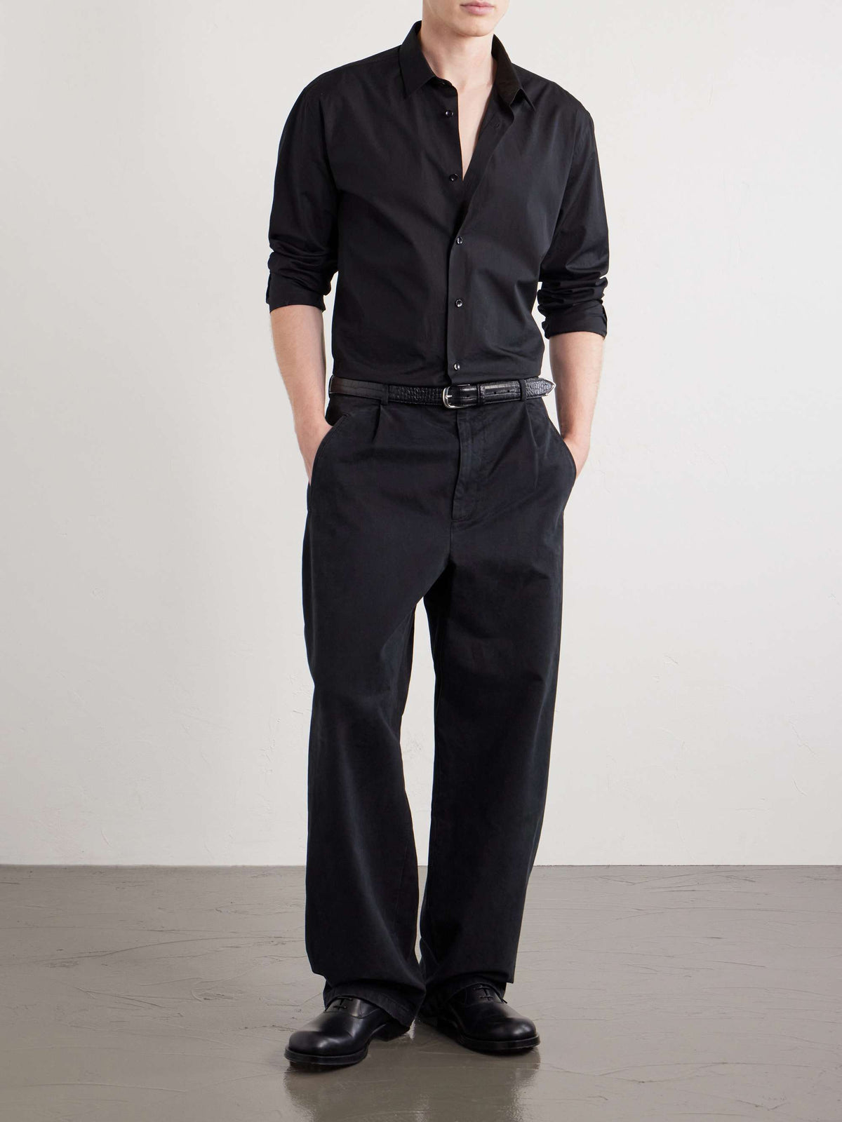 JIL SANDER Straight-Leg Pleated Cotton-Drill Trousers — full-length model look
